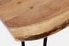 close up of wood counter stool