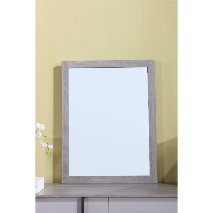 light grey mirror on dresser